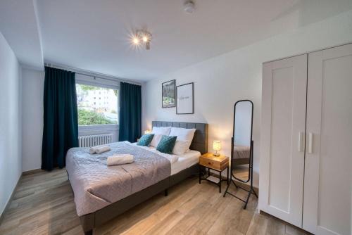 Frauenland Apartment | DND Stadtoase I Park I Workstation I Netflix I Parken I Kaffee I Waschmaschine I Trockner I Xbox