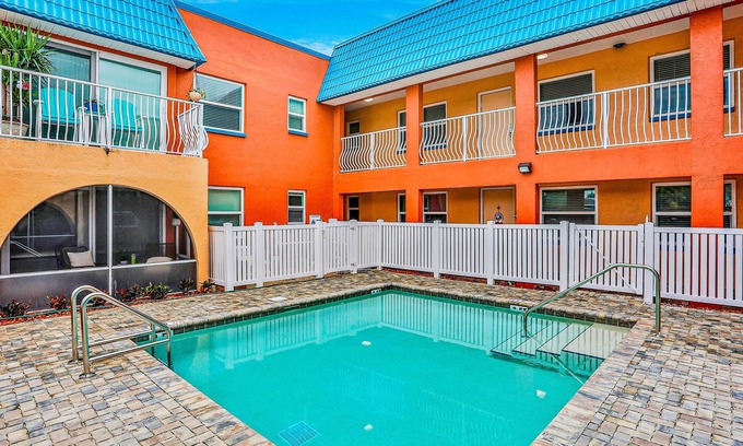 North Redington Beach Condo | Dog-friendly condo with pool, fitness area, balcony, fast WiFi, & W/D