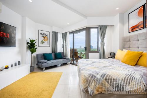 Maribago Apartment | Dominiks Stylish Resort Gem Ocean View Pool Queen Bed at Tambuli 8 Floor Fast Wifi