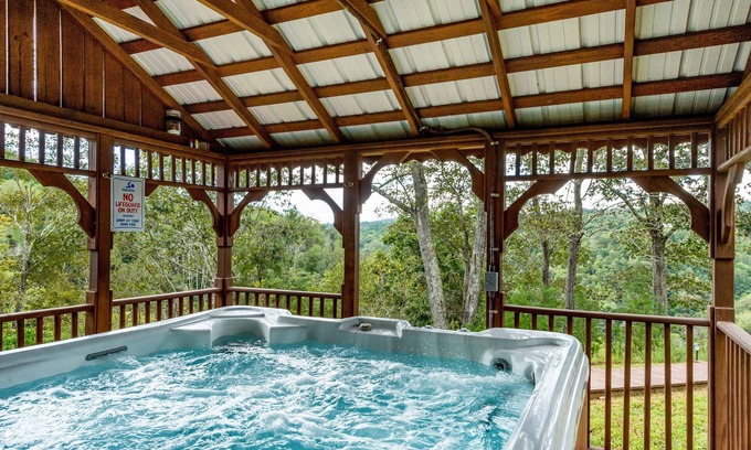 Marshall Cabin | Doolittle mountain cabin with hot tub, firepit & river views | near Asheville