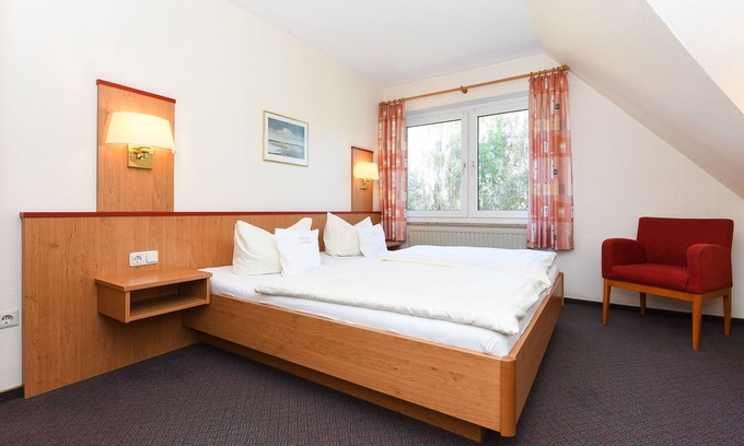 Esens Cottage | Doppelzimmer Norderney - Pension Nordkap in Bensersiel