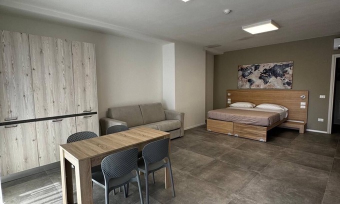 Fogliano House | Dormi-RE rooming house offers 12 elegant and comfortable rooms.