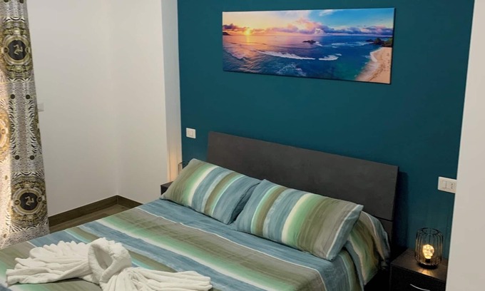 Reggio Calabria Apartment | Downtown apartment near station with private parking space