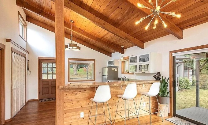 Freeland House | Downtown retreat with hot tub, & beach steps away