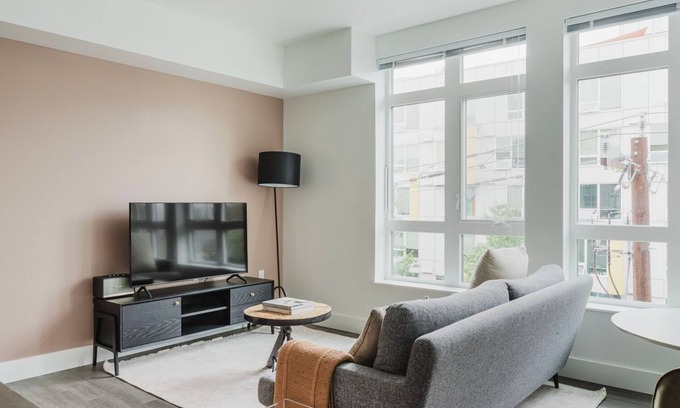 Squire Park Apartment | Dreamy First Hill Jr 1BR w/Bike Storage, Gym & W/D, by Blueground