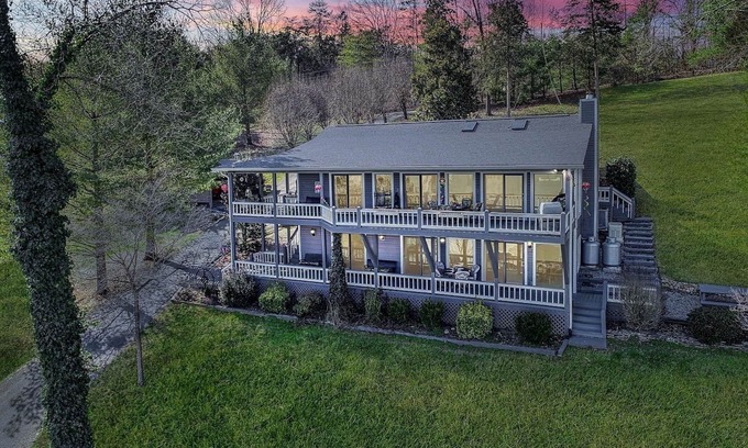 La Follette House | East Norris Point Breathtaking Lake View with Private Dock in Year Around Water