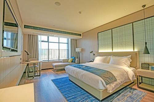 Pubei County Hotel | Echarm Hotel Pubei Chengxin Commercial Plaza
