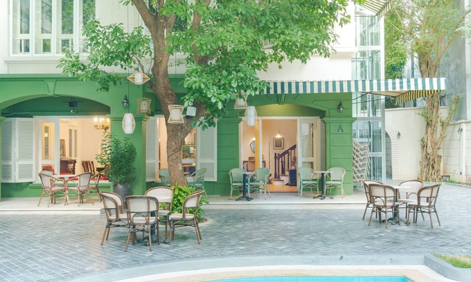Ba Dinh House | Éclectique is a home layered with stories, culture, and quiet beauty.