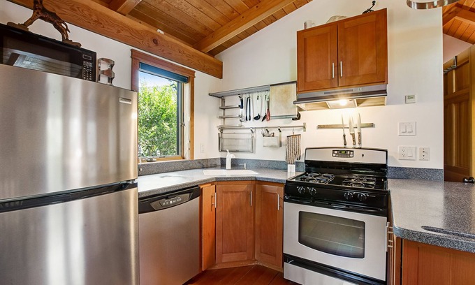 Bainbridge Island House | Eco home & studio with swim spa, Olympic views, home gym, & play structure