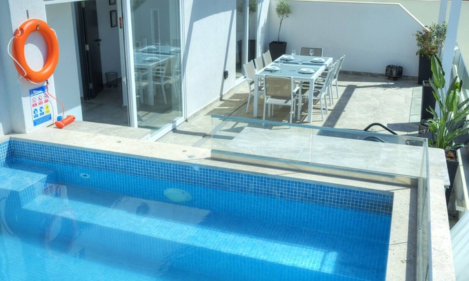 Tal-Ibrag Apartment | Elegant 2 bedrooms, large sun terrace, pool GCAT1-1