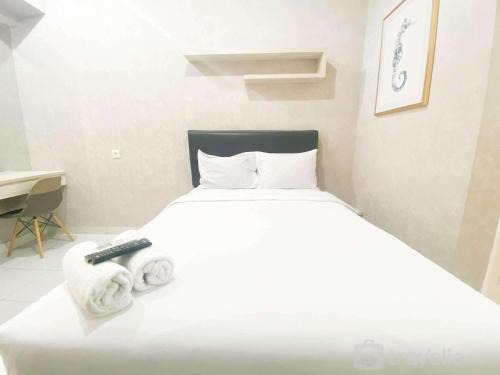 Semarang Apartment | Elegant and Homey Studio at Amartha View Apartment By Travelio
