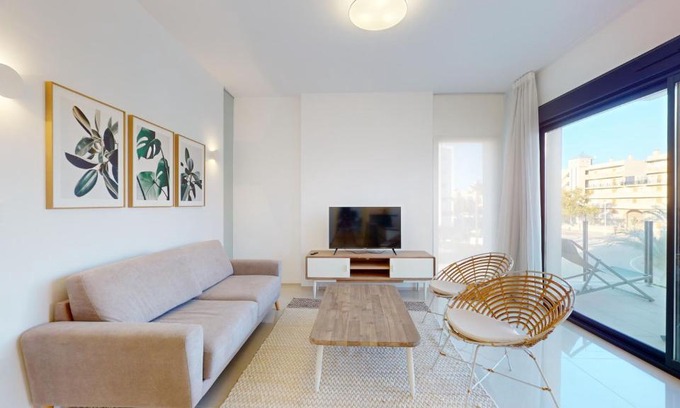 Els Arenals del Sol Apartment | Elegant apartment with pool AC and balcony