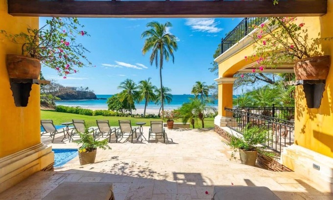 Playa Flamingo House | Elegant Mediterranean-Style Mansion with Beachfront Views and Private Infinity P