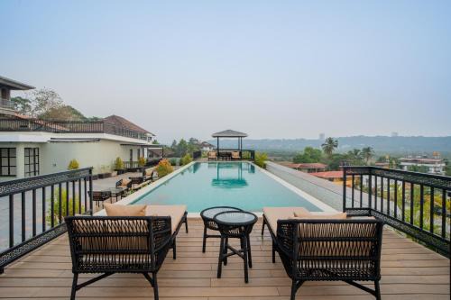 Saipem Apartment | ELIVAAS 1 BHK with Rooftop Pool - Kamerios Verano