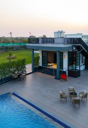 New Delhi Villa | ELIVAAS Ibiza 4 BHK Farmhouse with Pvt Pool, Garden & Indoor Bar