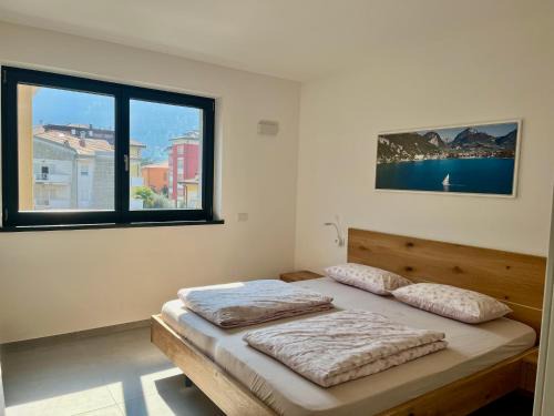 Riva del Garda Apartment | Emma`s Riva-Dream deluxe - sonnige 2-Zimmer-Wohnung mit privatem Parkplatz und Terrasse in Riva del Garda