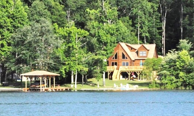 Bumpass House | Enchanting 5-Bed/5-Bath Lakefront Log Cabin with Private Cove, Beach & Hot Tub.