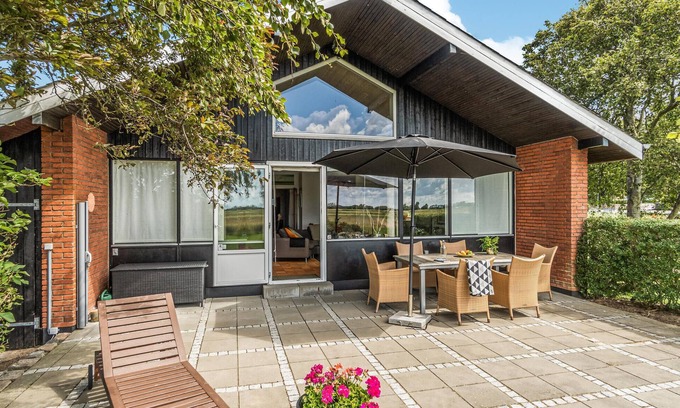 Hojer House | Enjoy a great view of the countryside from the terrace of this vacation home.