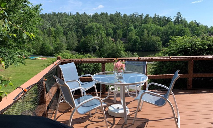 Grantham Condo | Enjoy beautiful water views from this light-filled condo with three levels of furnished living space