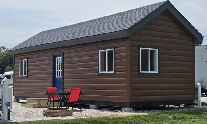 Tuscumbia Cabin | Enjoy cabin #64 at Heritage Acres Park with swimming, splash pad & more!