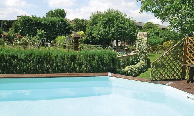 Marigny House | Enjoy the charm of this large yet cozy cottage with swimming pool in the communal garden.