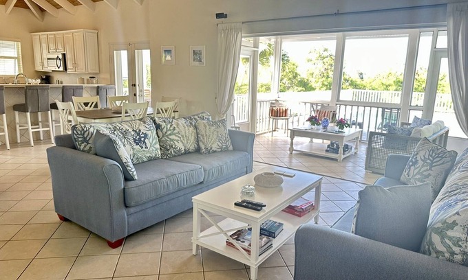 Providenciales Villa | Enjoy the oceanview and relax poolside. Steps to World Famous Grace Bay Beach.