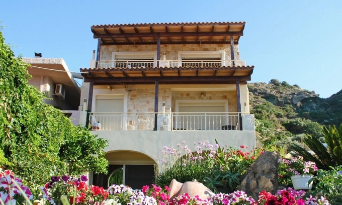 Lygaria Apartment | Enjoy uninterrupted views from your private balcony overlooking the bay