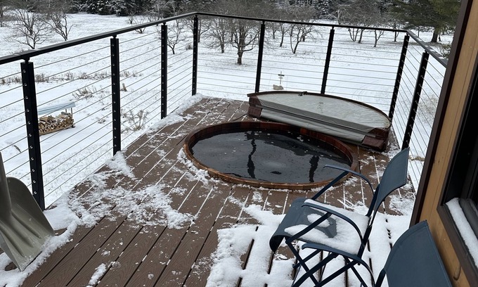 Vermontville Ski Chalet | Enjoy whatever winter throws at you while you relax in the hot tub with a view!