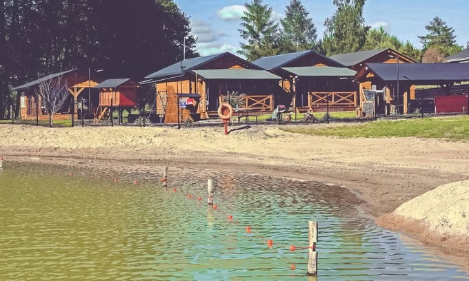 gmina Zakrzewo House | Enjoy your nature vacation on the lakeside of this cozy vacation home!