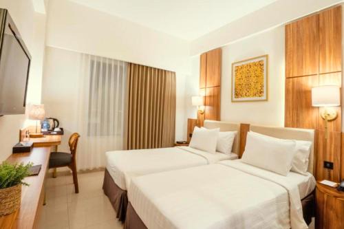 By Pass Ngurah Rai Kuta Apartment | Eremurus 1 BR Deluxe Room AN15
