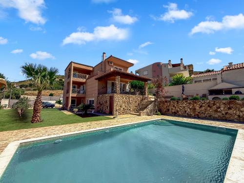 Lavreotiki House | Escape pool villa in Anavissos