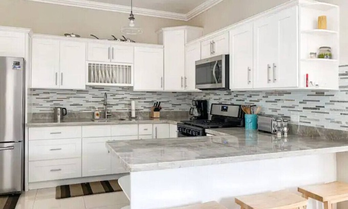 Ocho Rios House | Escape to Ocho Rios in this bright & airy coastal home. Central to attractions.