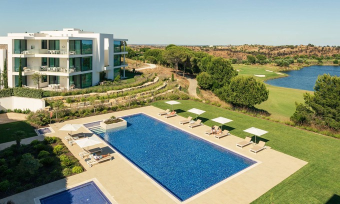 Vila Nova De Cacela Apartment | Escape to luxury in the Monte Rei 3-Bedroom Penthouse Apartment with a communal heated pool and stunning views