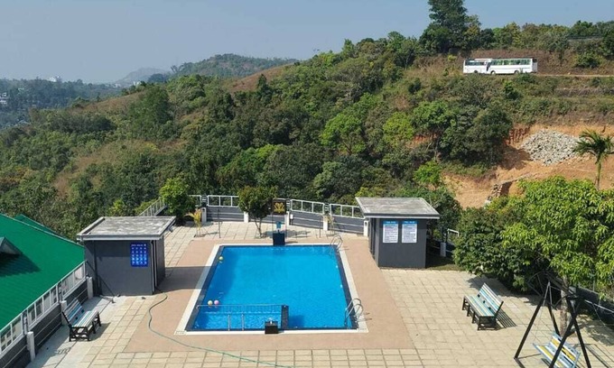 Vagamon Villa | Escape To Serenity, Vagamon's Hidden Gem: Luxurious Poolside Haven.