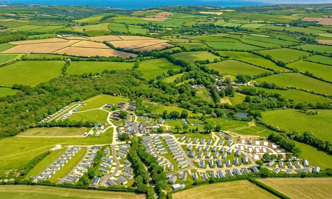 Hewas Water Ski Chalet | Escape to the Jasmine Lodge, nestled amidst stunning rolling countryside.