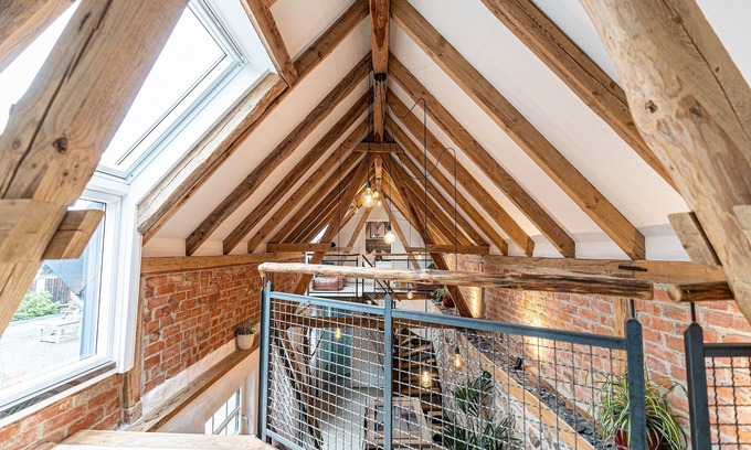 Rauhenebrach House | Exceptional barn loft with open roof truss