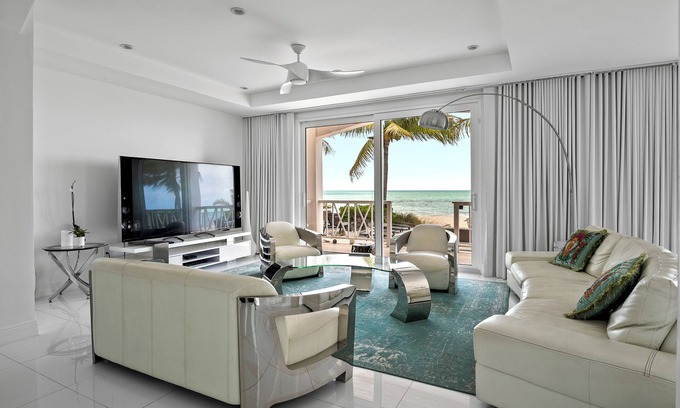 Nassau Villa | Exclusive Luxury Beachfront Villa - Private White Sand Beach, Upscale amenities.