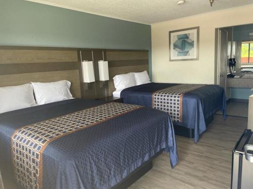 Beaumont Hotel | Executive Inn & Suites