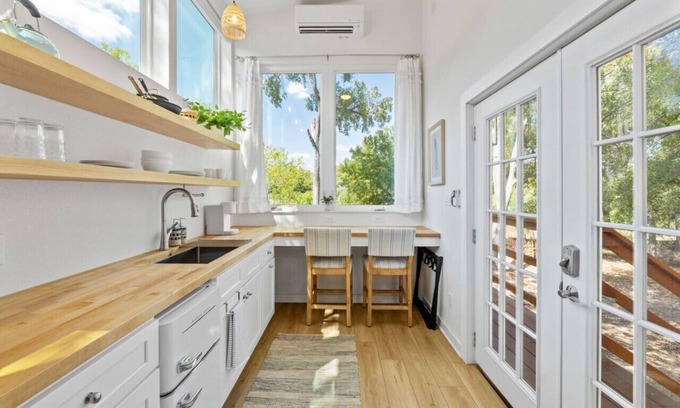 East MLK House | Extended Stay Haven: A+ Deck w/ Greenbelt Views!