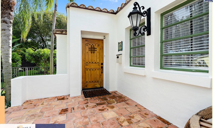 Old Northwood Historic District House | Extraordinary Getaway: Historic School Transformed into Luxury Oasis