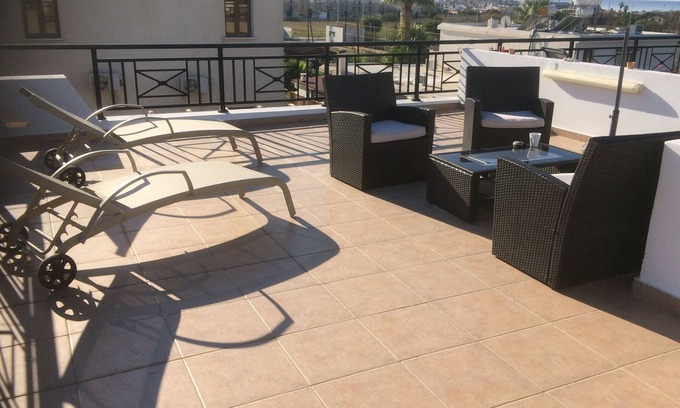 Paphos Apartment | Fabulous Roof Terrace near Tombs of the Kings on small complex with pool