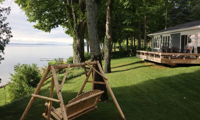 Suttons Bay Cottage | Fall openings w/late check out, Breathtaking waterfront, 2 SUP & 3 kayak & bikes