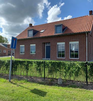 Sluis House | familieverblijf De groene Specht