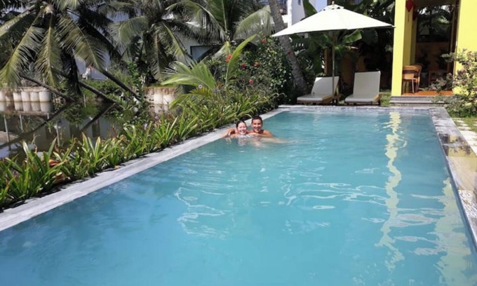 Cam Thanh Apartment | Family Room includes 2 beds Pool, Lake View