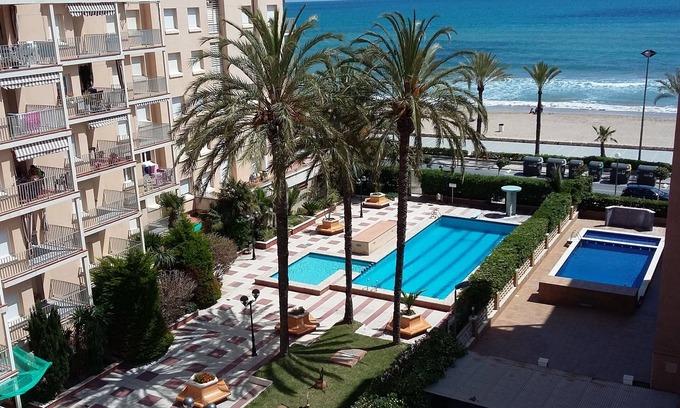 Cunit Apartment | Fantastic apartment on the seafront with 2 swimming pools and garden area