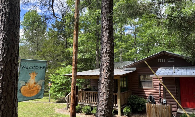 Board Camp Cabin | Fenced for your fur babies!
