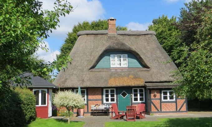 Damp House | Ferienhaus Frieda - Urlaubsparadies unter Reet