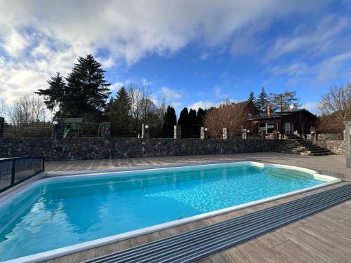 Dolgen am See House | Ferienhaus MILA - Pool, Sauna, Whirlwanne, 5000qm Privatgelände mit Bolzplatz