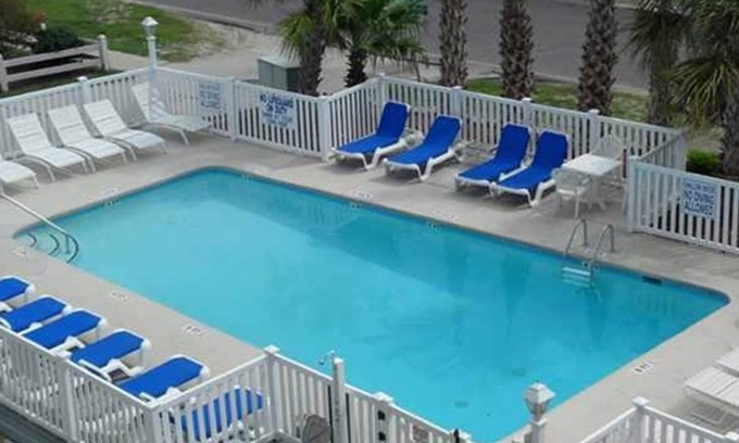 Garden City Condo | First Floor - Right Across the Street from the Beach - Whispering Sands Unit 104