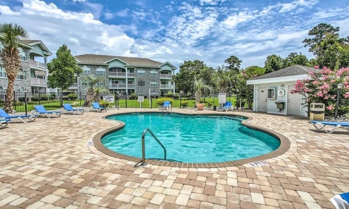 Central Myrtle Beach Condo | First Floor Updated Coastal Summer Retreat at Magnolia Place - Pool View